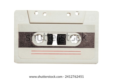 Isolated photo of old fashioned, white colored audio tape cassette on white background.