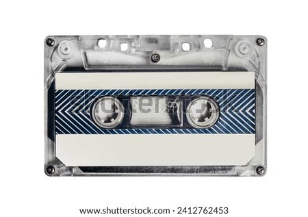 Isolated photo of old fashioned audio tape cassette on white background.