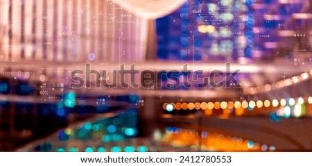 Technology screen with big city lights at night
