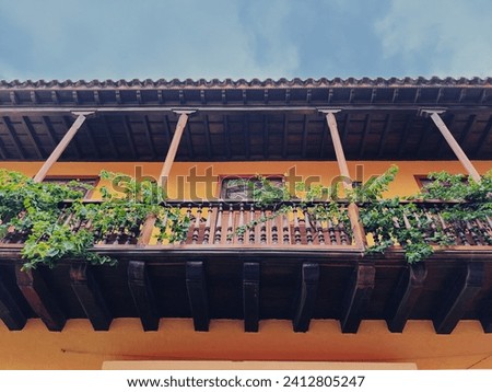 colonial house balcony with plants