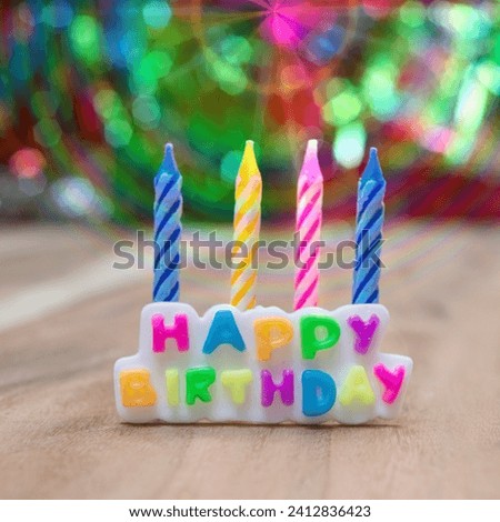 The image shows a birthday candles. The cake has the word "HAPPY" written on it. It's tagged as a birthday cake, candles, candy, confectionery, and dessert.