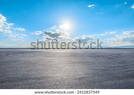 Asphalt road square and sky clouds with sun natural landscape