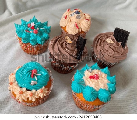 Indulge in the enchanting world of sweetness with this captivating cupcake image. The delicate swirls of frosting atop a moist and flavorful base create a visual symphony of taste and texture. Perfect