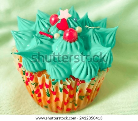 Indulge in the enchanting world of sweetness with this captivating cupcake image. The delicate swirls of frosting atop a moist and flavorful base create a visual symphony of taste and texture. Perfect