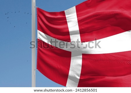 The national flag of Denmark A white Nordic cross with a red background