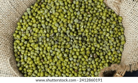 Close-up of mung beans in a burlap sack