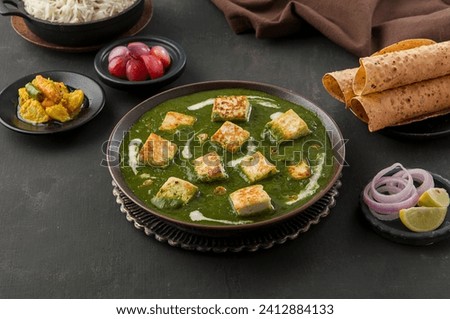 Palak Paneer in restaurant style set-up Royalty-Free Stock Photo #2412884133