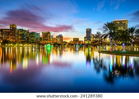 Orlando, Florida, USA downtown city skyline on Eola Lake. Royalty-Free Stock Photo #241289380