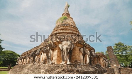Wat Chang Lom is an ancient site within the city walls. Si Satchanalai Historical Park, Si Satchanalai District, Sukhothai Province, Thailand. Ancient sites, tourist attractions in Sukhothai, Thailand Royalty-Free Stock Photo #2412899531