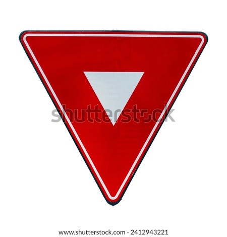 The image portrays a Give Way traffic sign, remarkable in indicating priority and traffic flow. It amplifies the need for cooperation and respect among drivers, contributing to a safe