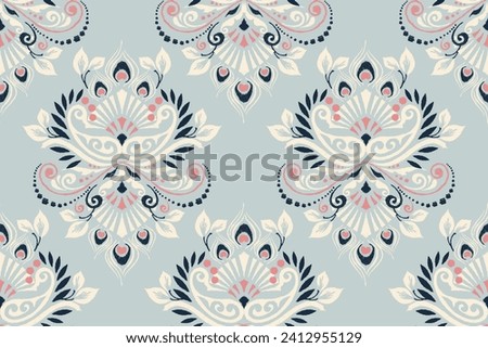 Ikat floral paisley embroidery on blue background.Ikat ethnic oriental pattern traditional.Aztec style abstract vector illustration.design for texture,fabric,clothing,wrapping,decoration,scarf,carpet.