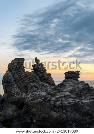 Suggestive overview of the protected marine reserve of the Cyclops Riviera at sunset Royalty-Free Stock Photo #2413019089