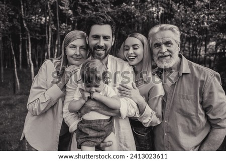 Black and white picture of big happy family