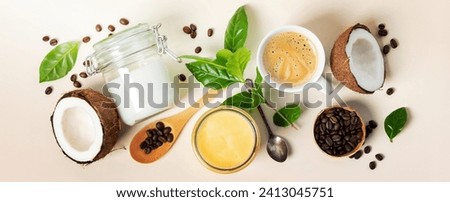Bunner with Ingredients for paleo style and ketogenic bulletproof coffee: coconut oil, butter, coffee, flat lay, top view Royalty-Free Stock Photo #2413045751