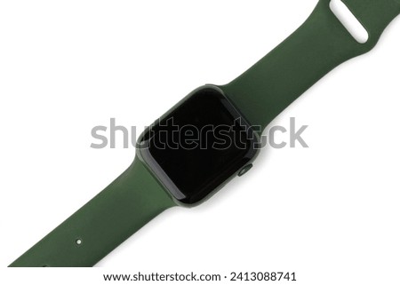 Wrist electronic watch with green silicone bracelet isolated on white background