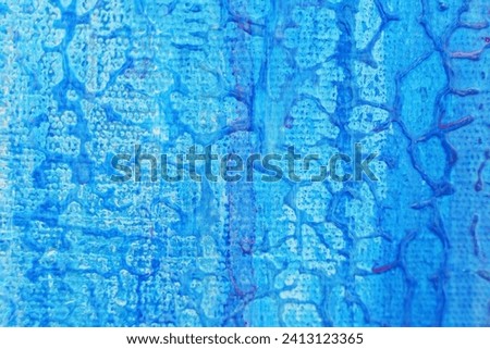 Texture of canvas painted blue with veins. Texture and backgrounds