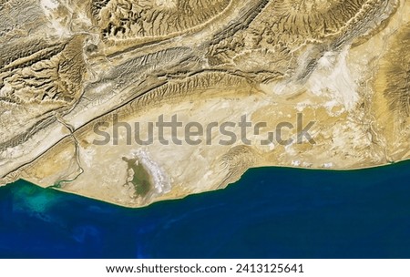 Hingol National Park. With its rocky terrain, mountain caves, and beautiful beaches, Hingol National Park is one of the natural wonders. Elements of this image furnished by NASA.
