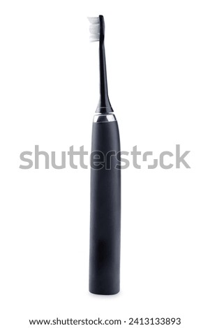 Electric toothbrush on a white isolated background.