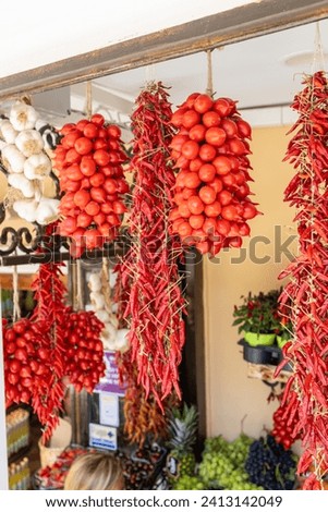 Dried Calabrian chili peppers hanging on the street market