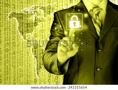 Businessman selecting a white padlock with world map on the background
