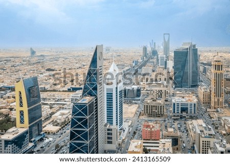 Aerial panorama of downtown of Riyadh city with skyscrapers of Al Olaya central business district, Al Riyadh, Saudi Arabia Royalty-Free Stock Photo #2413165509