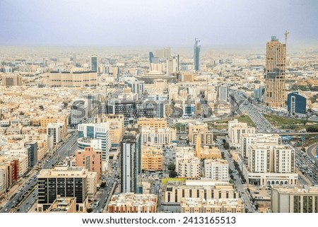 Aerial large panorama of downtown and outskirts of Riyadh city, Al Riyadh, Saudi Arabia Royalty-Free Stock Photo #2413165513