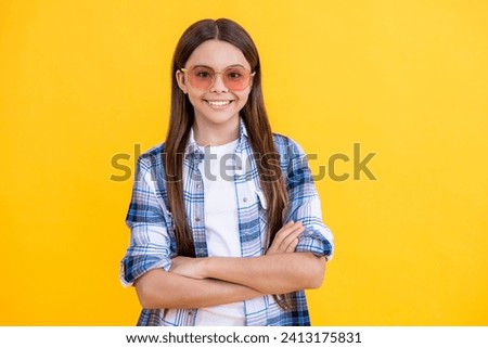 teen girl with long hair. teen girl in casual style. Young teen girl standing in sunglasses. Beautiful teen girl wearing checkered shirt. feel the confidence