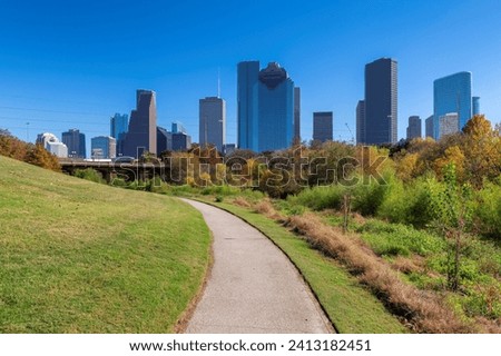 Alley in Houston downtown at sunny autumn day in Eleanor Tinsley Park, Houston, Texas, USA