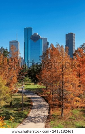 Park alley in Houston downtown at sunny autumn day in Eleanor Tinsley Park, Houston, Texas, USA