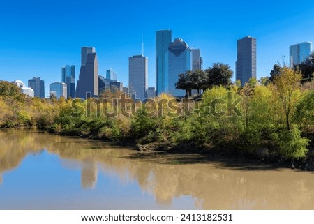 Houston downtown at sunny day from river in Buffalo Bayou Park, Houston, Texas, USA	