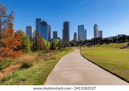 Houston skyline at sunny autumn day, alley in Buffalo Bayou Park, Houston, Texas, USA	