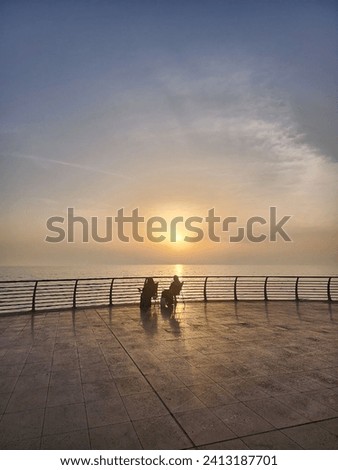 Beautiful and bright sunset on the shores of the Red Sea on the coast of Jeddah, Saudi Arabia.