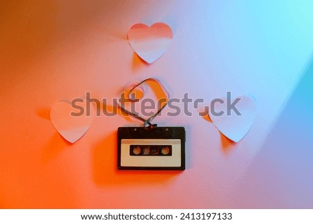 
Audio Cassette with Heart Shaped Tape Love Music Concept. Romantic songs on an analogue vintage mixtape 

