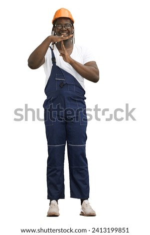 A man in a construction suit on a White background shows a full-length pause sign