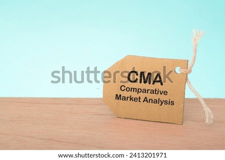 A Comparative Market Analysis (CMA) is an evaluation of the current market value of a property by comparing it to similar properties in the same geographical area that have recently been sold Royalty-Free Stock Photo #2413201971