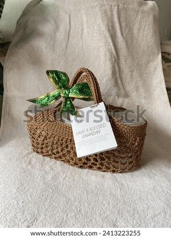 Cookies Hampers with Crocheted Bag and Ribbon for Ramadan or Eid Royalty-Free Stock Photo #2413223255