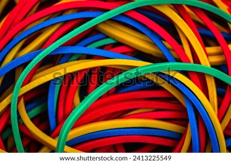 Colorful and varied elastic bands in detail