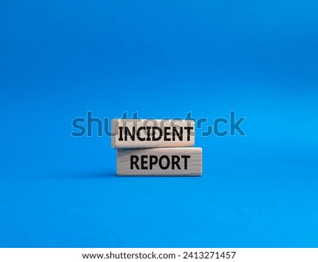 Incident Report symbol. Concept word Incident Report on wooden blocks. Beautiful blue background. Business and Incident Report concept. Copy space Royalty-Free Stock Photo #2413271457