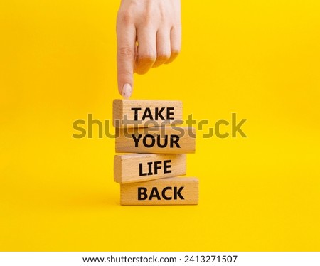 Take your life Back word symbol. Wooden blocks with words Take your life Back word. Psychologist hand. Beautiful yellow background. Psychology and Take your life Back word. Copy space.
