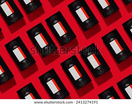 Videotape pattern on a red fon