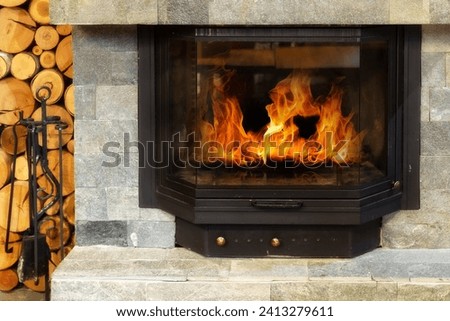Stone Fireplace with burning fire, Cozy Winter