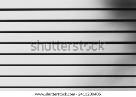 Background of white boards. Abstract texture of white painted wooden planks, boards with shadow.