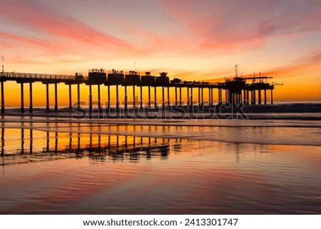 
Dramatic Sunset Sky Colors Above Scripps Memorial Pier USCD Salk Institute of Oceanography La Jolla Pacific Ocean Coast San Diego Beach California USA