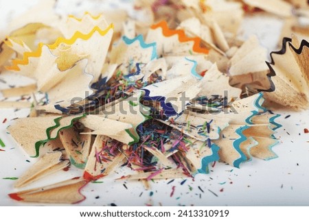 Macro view of colorful blue, green, orange and red pencil peels