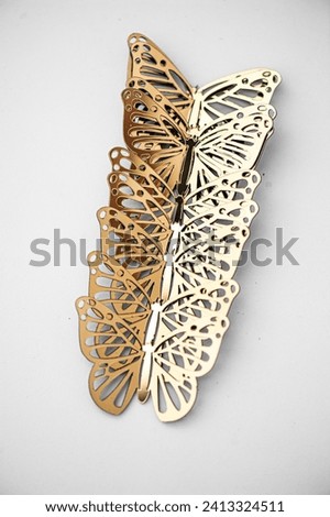 beautiful gold butterflies on white background. Decoration trend