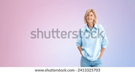 Portrait of cheerful young European woman wearing casual clothes standing over pink copy space background. Concept of joy and positive emotions