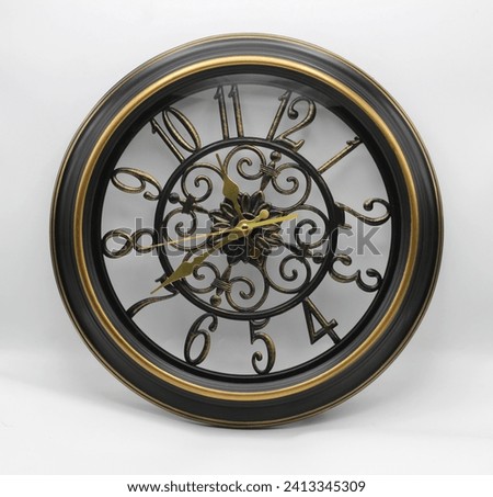 Elevate your space with timeless elegance. Explore our diverse collection of wall clocks from classic to modern designs, find the perfect timepiece to enhance your decor.  Royalty-Free Stock Photo #2413345309