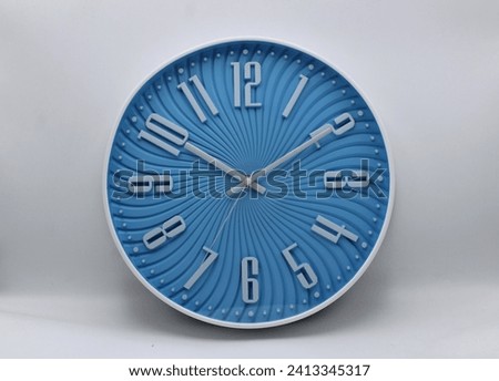Elevate your space with timeless elegance. Explore our diverse collection of wall clocks from classic to modern designs, find the perfect timepiece to enhance your decor.  Royalty-Free Stock Photo #2413345317