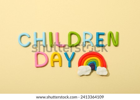 The inscription Children's Day on a light background