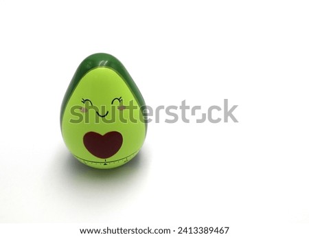 Green Avocado Kitchen Timer icon diet meal prep figure cooking and baking tool with loving heart happy and smiling face epxpression on white background Royalty-Free Stock Photo #2413389467